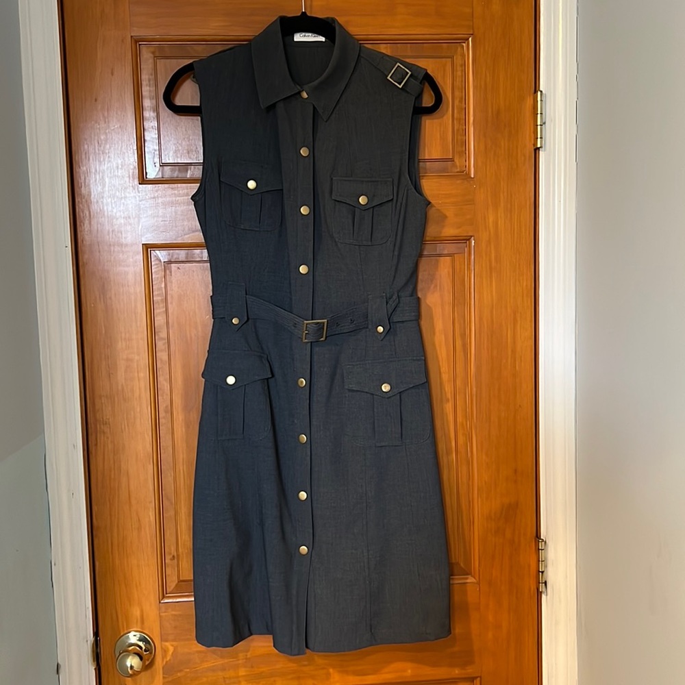 Calvin Klein dress like new worn once. Four pockets and belt
